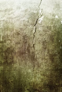 cracked wall green grunge background and texture