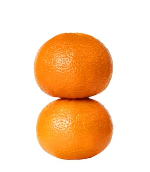 Two oranges stacked together isolated