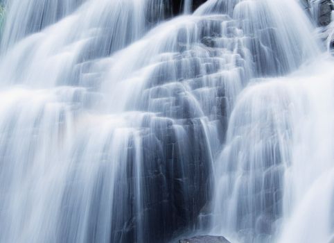 falling water in the mountains close up