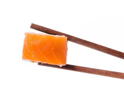 Sushi in chopsticks isolated on a white background