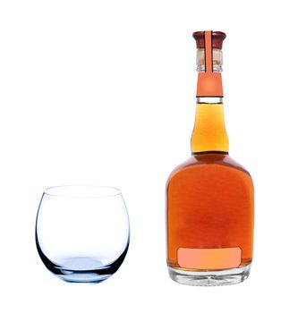 whiskey bottle with empty glass