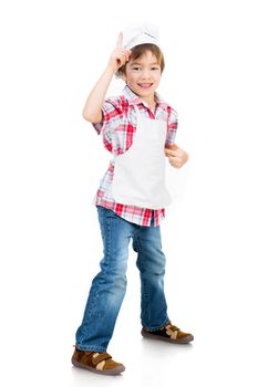 smiling boy dressed as a cook shows up isolated on a white background