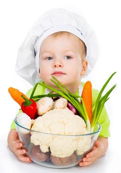 cute boy with vegetables isolated on a white