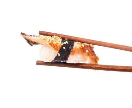 Sushi in chopsticks isolated on a white background