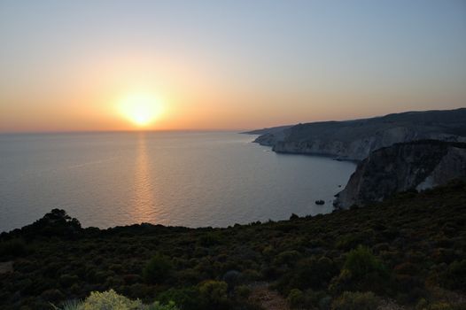 Coastal ridges and sea in the sunset. Island of Zakynthos, Greece.