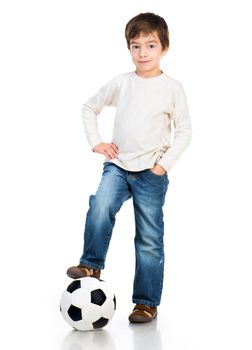 Little boy playing soccer ball isolated on white