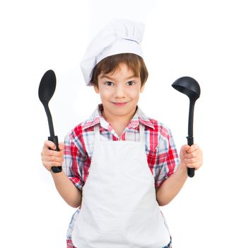 Cute boy with black spoons isolated on white background