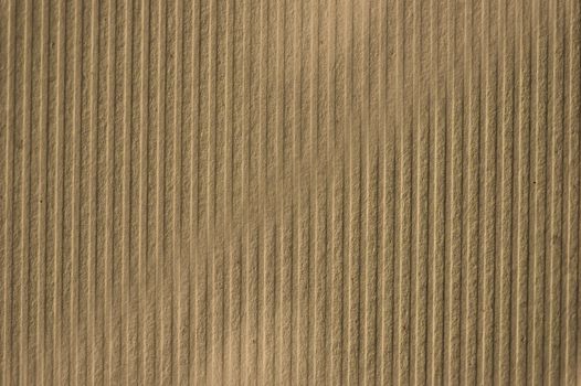 Recycled striped cardboard paper macro. Background texture.