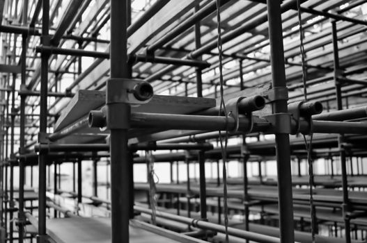 Metal industrial shelves in warehouse storage. Spatial dimension.