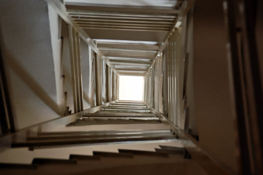 Staircase spiral perspective interior architecture background.