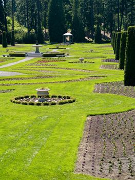 A Well Groomed Park in Early Spring with a Paved Path