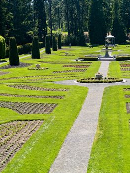 A Well Groomed Park in Early Spring with a Paved Path