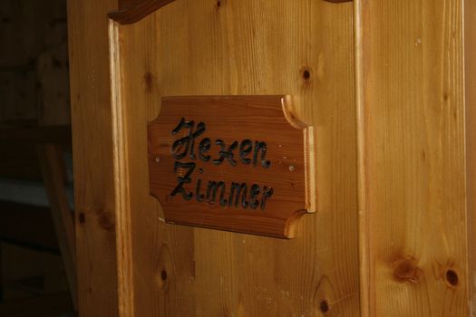 Sign witches room on a wooden door