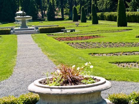 A Well Groomed Park in Early Spring with a Paved Path