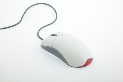 computer mouse with cable on white background