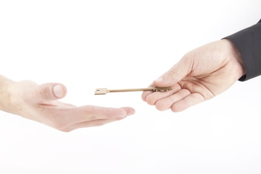 one hand giving keys to other isolated