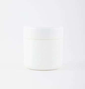 cosmetic container on white background