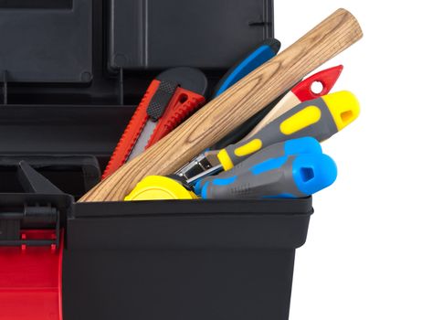 Set of construction tools in the box close up isolated on white background.