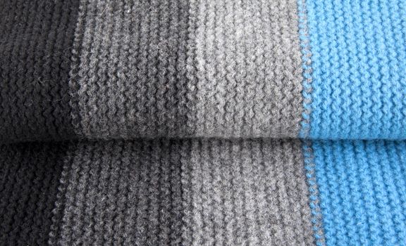 Striped woolen textile background or texture for site