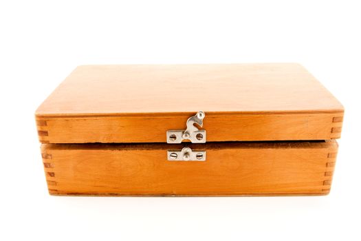 Opened vintage wooden chest on white background