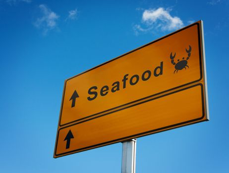 Sea food road sign with icon a crab. Place for text.