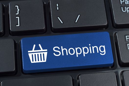 Shopping button keypad with basket icon. Internet concept of consumerism and e-commerce.