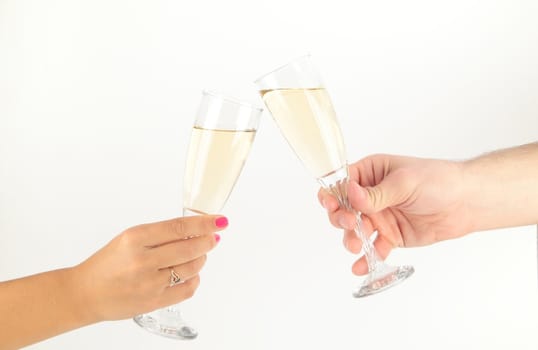 man and woman hands with champagne glass