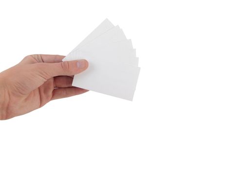 Hand holding many business cards on white background