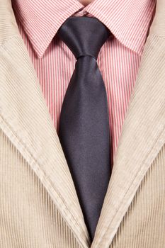 Close-up of red striped shirt with black tie