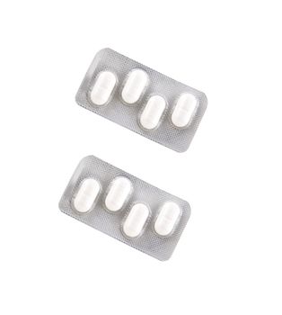 Two pill packs isolated on white background for site