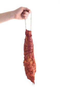 hand holding meat isolate on white background