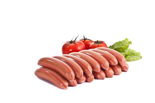 sausages with tomato and salad isolated on white