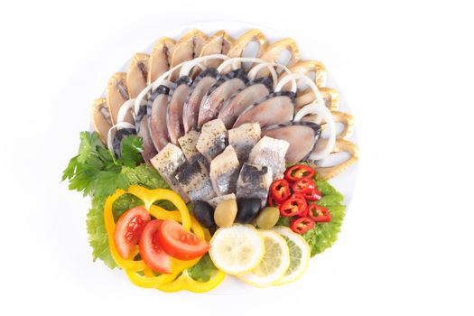 various herring with vegetables isolated on white