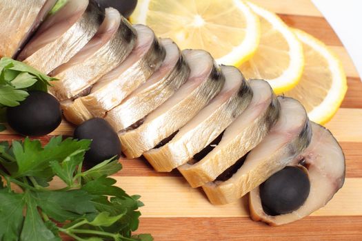 herring fillets with herbs isolated on white