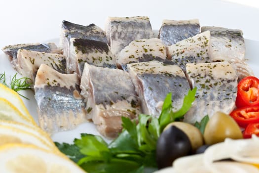 close up sliced fish with vegetables isolated