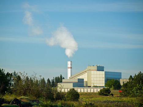 Waste to Energy Plant with Smoke Coming Out of a Smokestack 