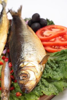 fish with lemon on plate close up