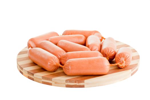 delicious sausages on board isolated on white