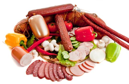 sliced sausages with vegetables and red papper for site