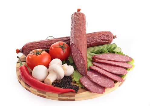 sliced sausage with vegetables and red papper for site