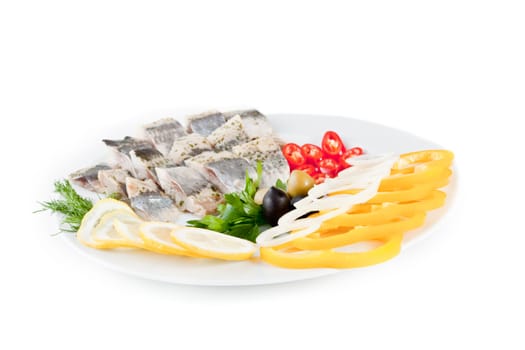 fish with vegetables and olives isolated on white