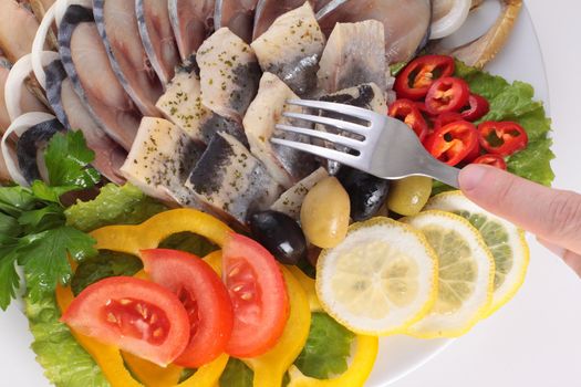 fish with vegetables,anion red pepper close up