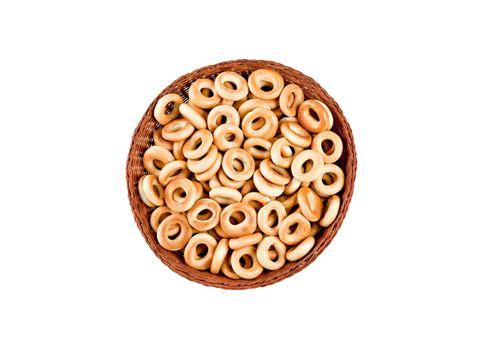 small bagels in basket isolated on white