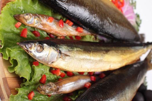 fish on plate with red pepper close up