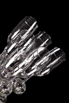 empty glasses of champagne isolated on black