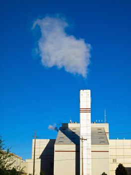 Waste to Energy Plant with Smoke Coming Out of a Smokestack