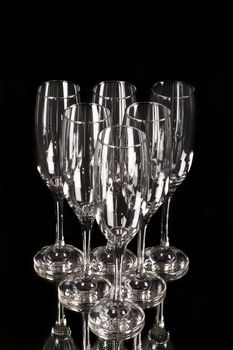 empty glasses of champagne isolated on black