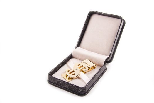 golden clip in box isolated on white