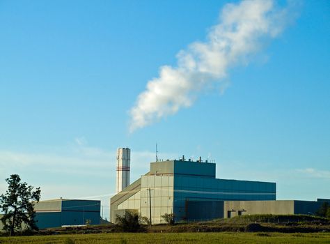 Waste to Energy Plant with Smoke Coming Out of a Smokestack