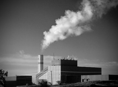 Waste to Energy Plant with Smoke Coming Out of a Smokestack